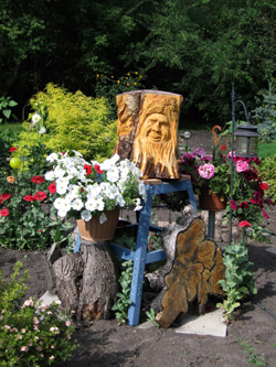 Trunk and Stump Wood Carvings - Trio in the Garden